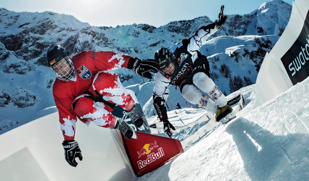 two cross ice skater racing to the finish line